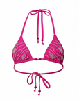 Pink bikini top with floral patterns on a white background