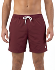 Burgundy sustainable swim shorts with a white drawstring on a white background