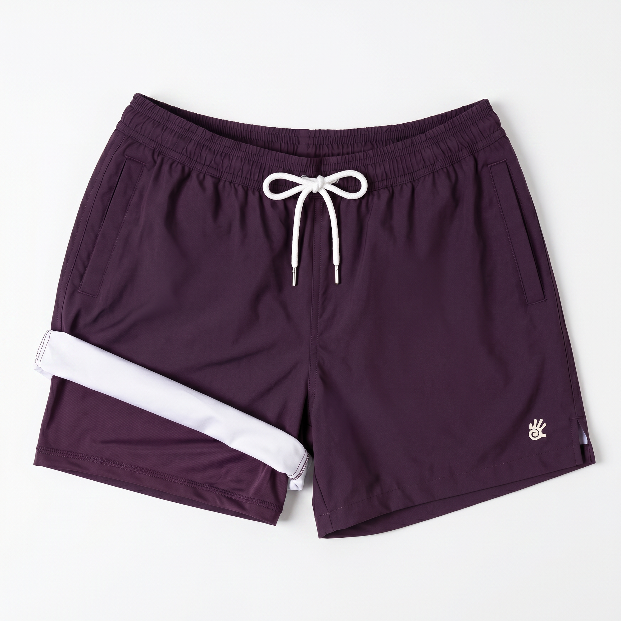 Flat lay image on a white backdrop of Men's purple swim shorts. The left leg of the swim shorts if rolled up to show the built in boxer lining.  