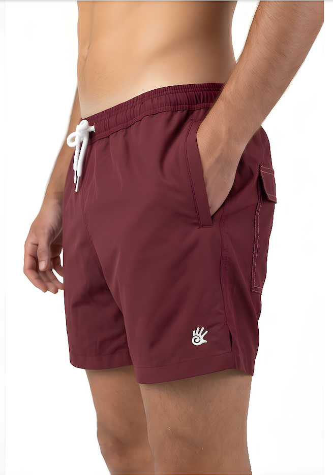 Burgundy mens swim shorts with a logo on a white background